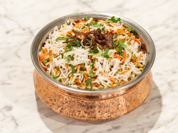 Biryani in copper bowl